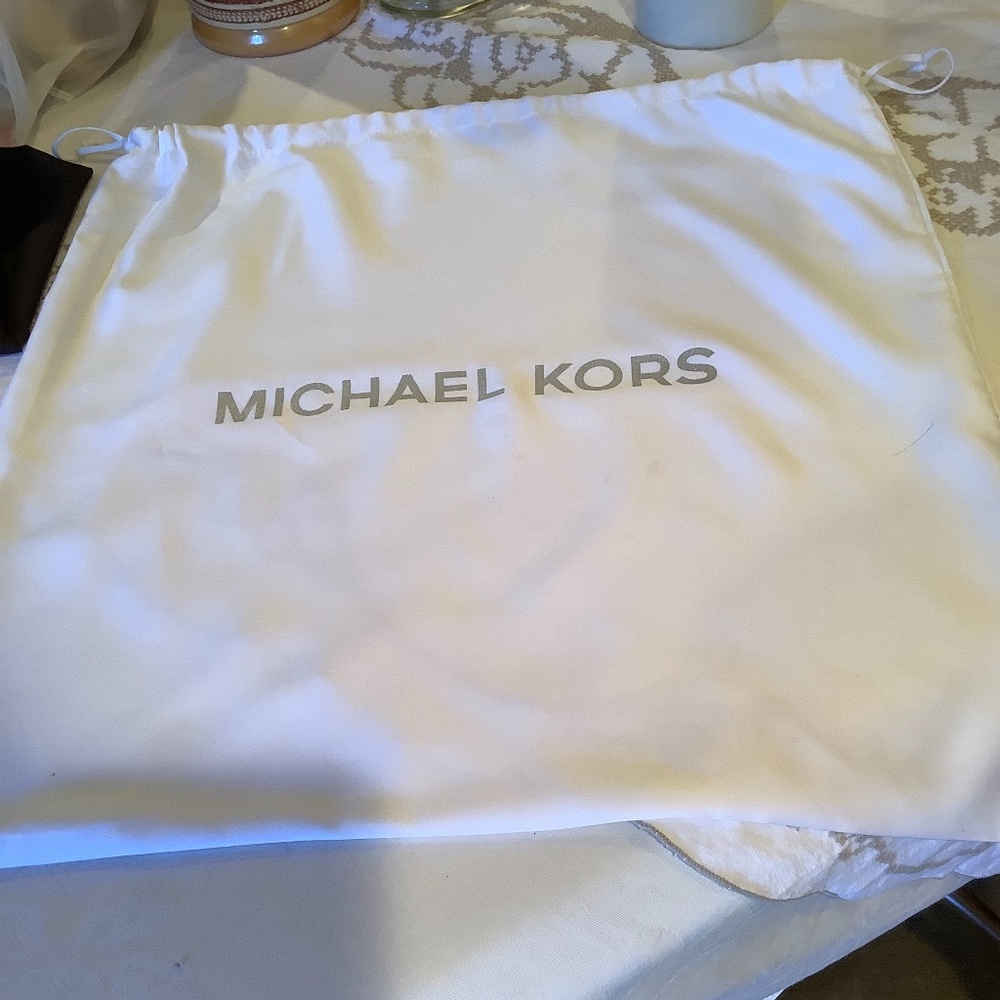 Michael Kors white with silver dust bag